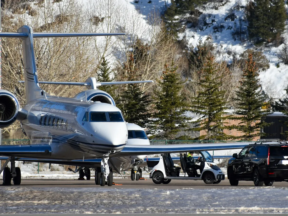 Private jet on a snowy ramp in the mountains