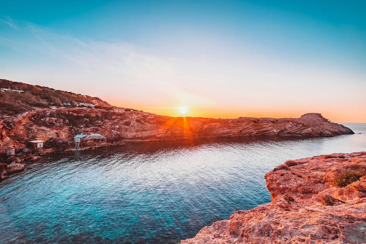 Sunset over the sea cliffs of Ibiza